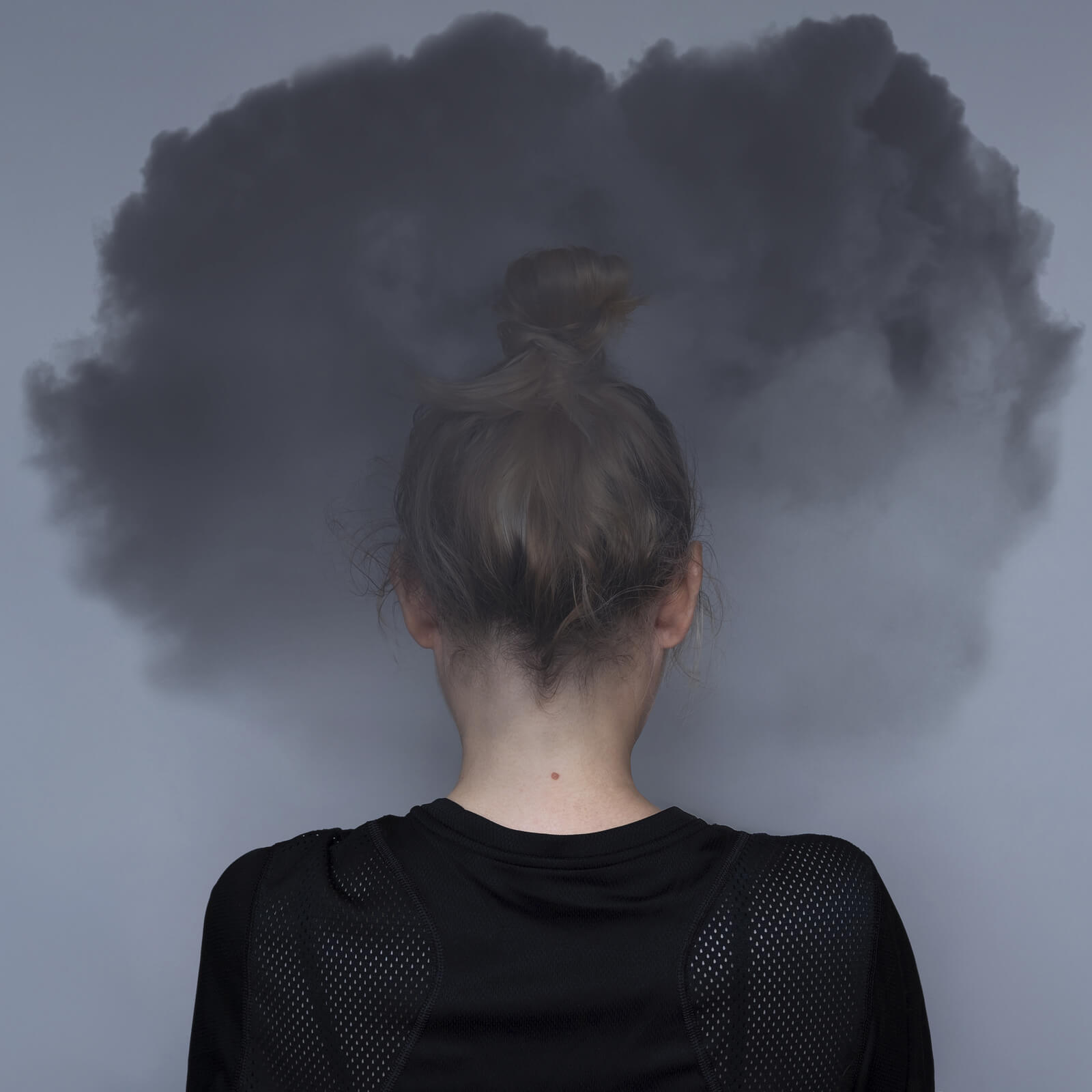 A woman stands with a dark cloud around her head. This could represent the stress depression treatment in Seattle, WA can offer support with. Contact a depression therapist in Seattle, WA to learn how to overcome your depression symptoms in Seattle, WA today.
