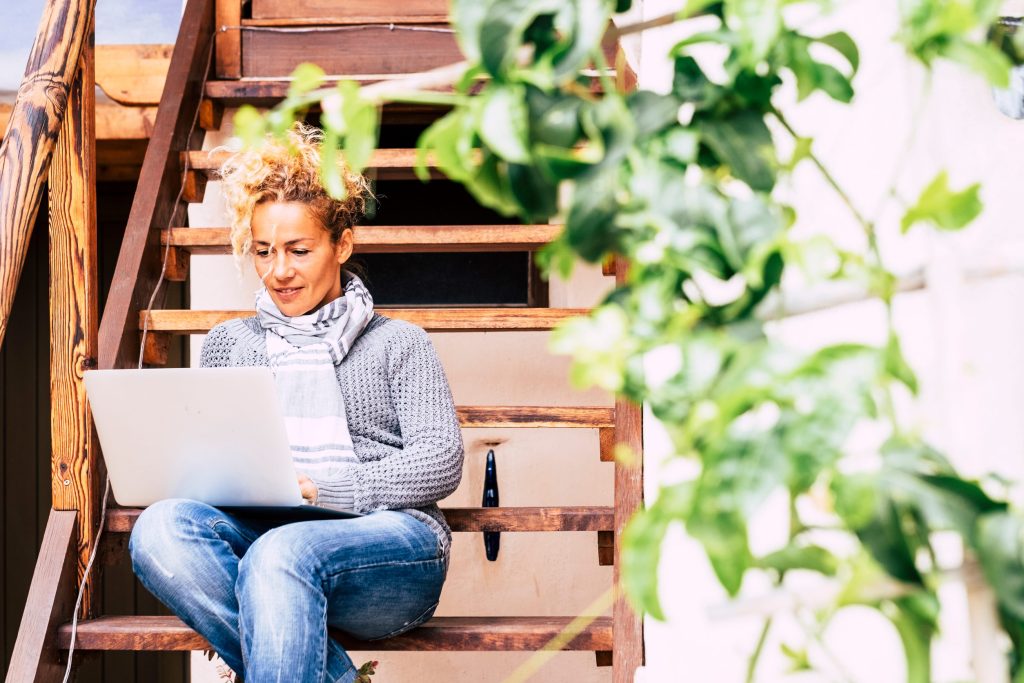 Middle age young caucasian woman having an online therapy session.